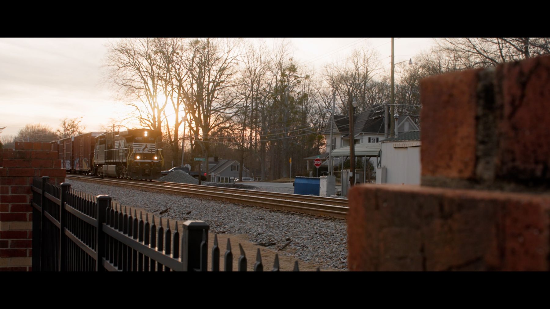 Sunset over railroad tracks, from the Chipotle benefits story